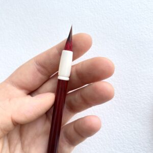 Pincel caligráfico, lobo vermelho