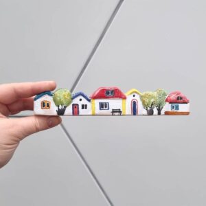 Enfeite de mesa Casinhas %